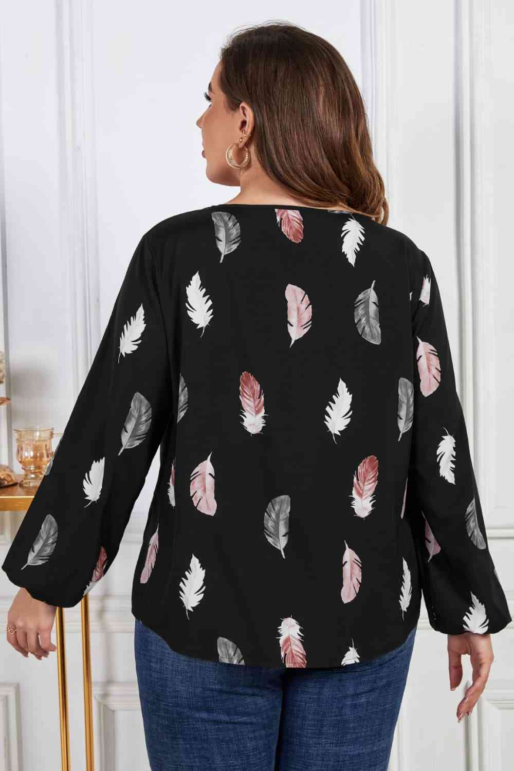 Melo Apparel Printed Round Neck Long Sleeve Cutout Blouse