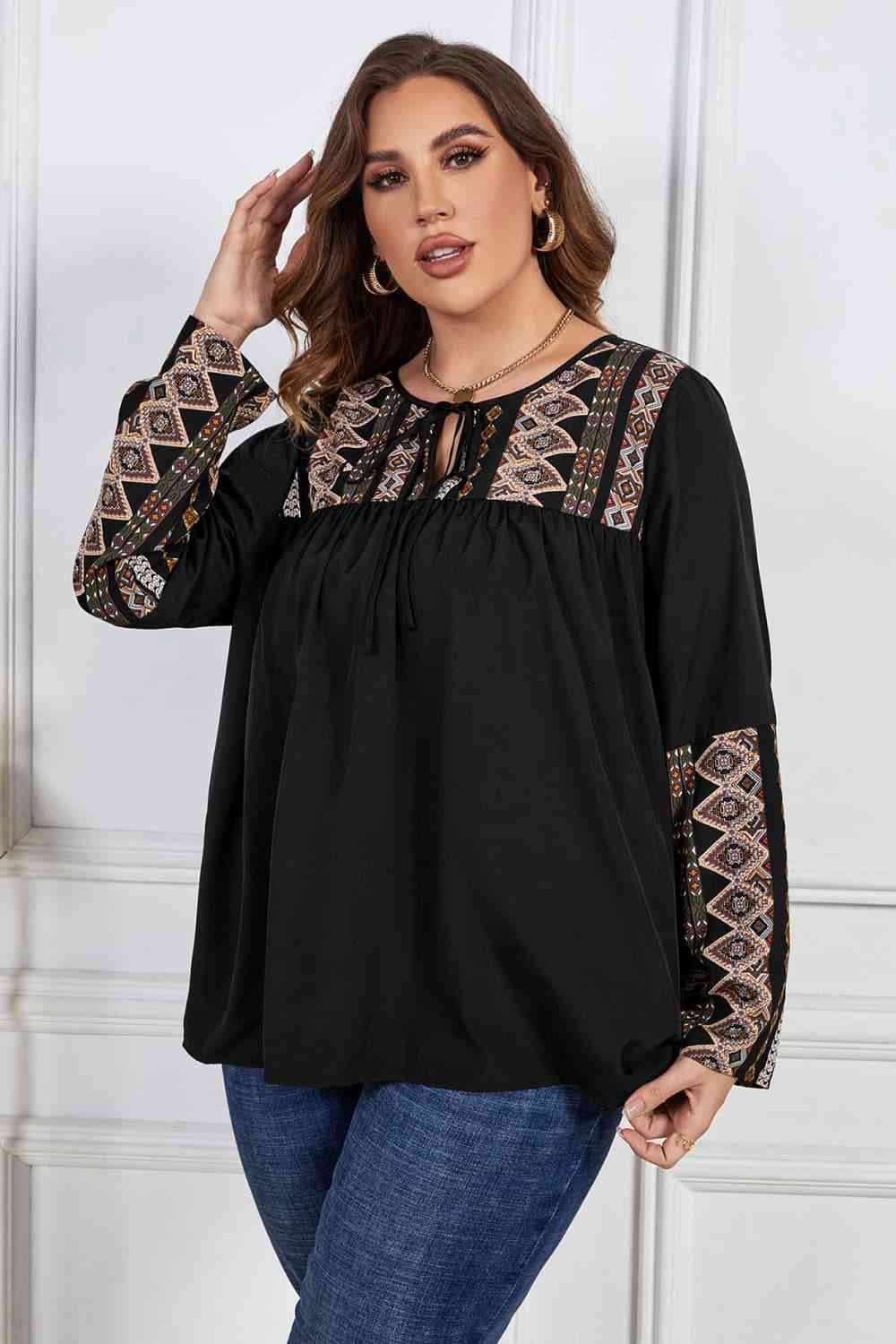 Melo Apparel Printed Round Neck Tie Front Blouse