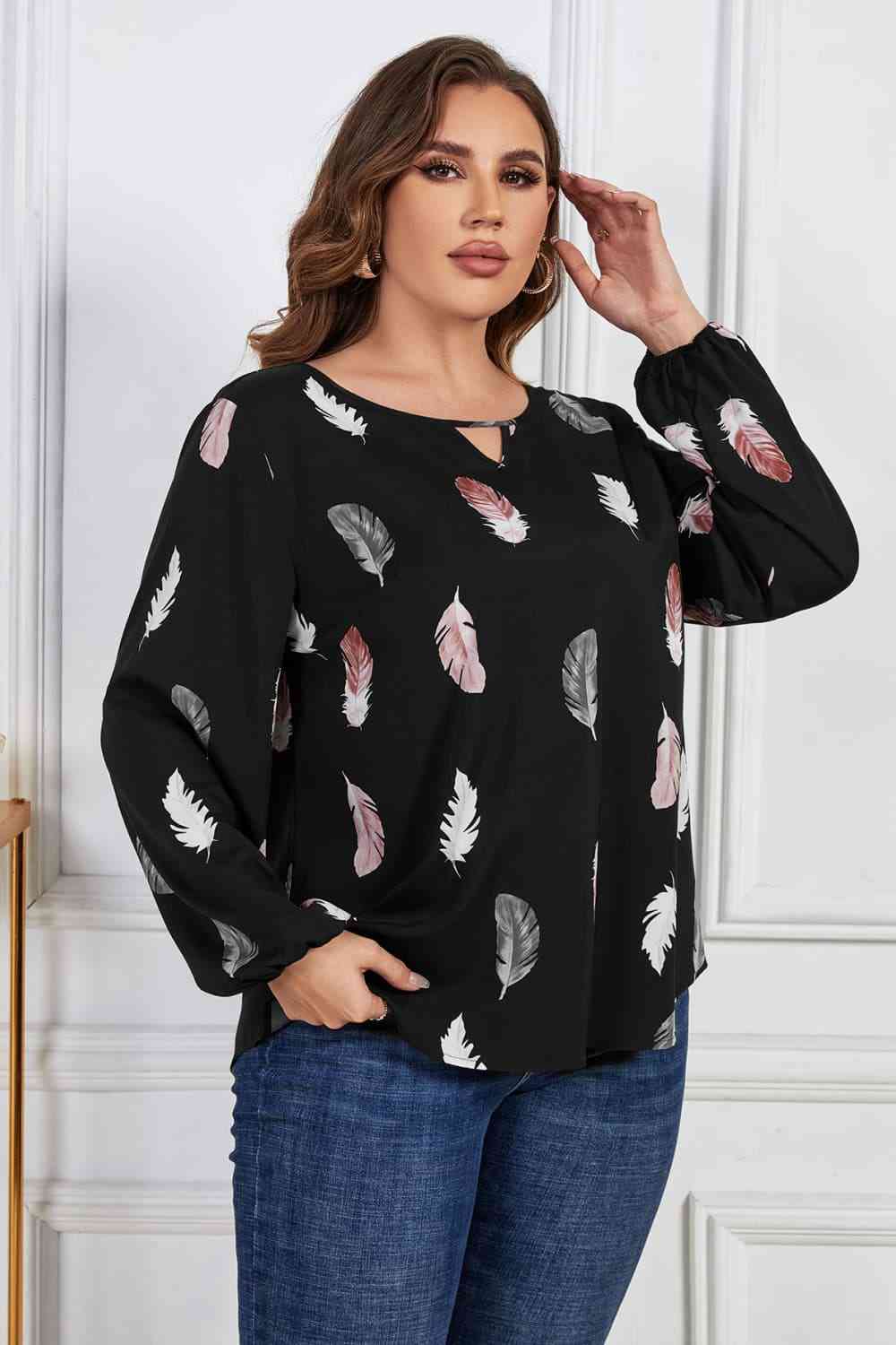 Melo Apparel Printed Round Neck Long Sleeve Cutout Blouse